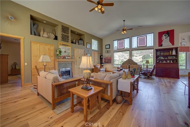 670 Highland Hills Rd, Nipomo, CA 93444 - living area featuring ceiling fan, high vaulted ceiling, light wood-style floors, and a glass covered fireplace