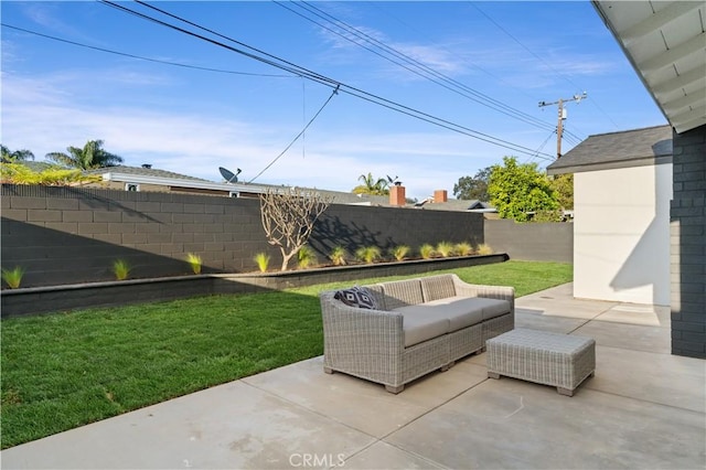 1825 W Carlton Pl, Santa Ana, CA 92704 - fenced backyard featuring a patio area and an outdoor hangout area