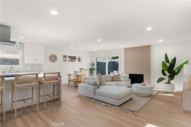 1825 W Carlton Pl, Santa Ana, CA 92704 - living area with recessed lighting and light wood-style floors