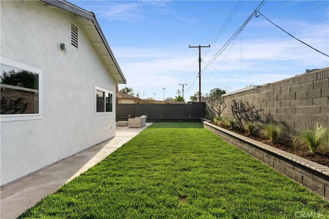 1825 W Carlton Pl, Santa Ana, CA 92704 - fenced backyard with a patio and an outdoor hangout area