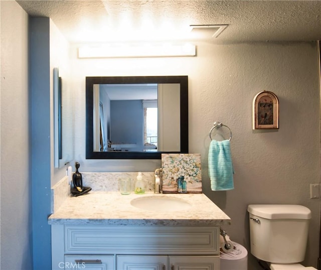 24055 W Paseo Del Lago Unit 962, Laguna Woods, CA 92637 - bathroom with vanity and a textured ceiling