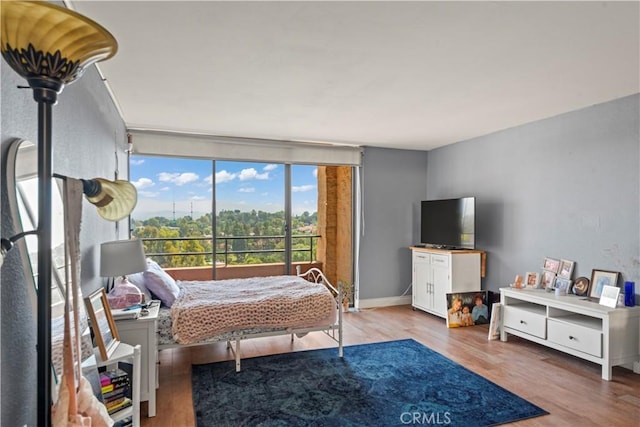 24055 W Paseo Del Lago Unit 962, Laguna Woods, CA 92637 - bedroom featuring wood finished floors