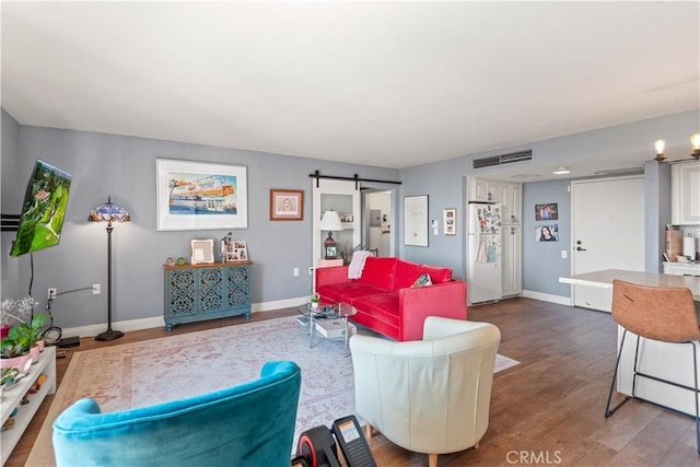 24055 W Paseo Del Lago Unit 962, Laguna Woods, CA 92637 - living room with wood finished floors and a barn door
