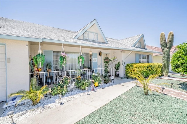 1181 W Westmont Ave, Hemet, CA 92543 - view of front of house with covered porch and stucco siding