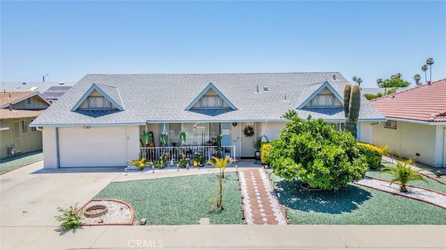 1181 W Westmont Ave, Hemet, CA 92543 - view of front of house featuring covered porch, concrete driveway, an attached garage, and roof with shingles