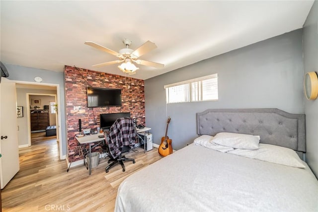 1181 W Westmont Ave, Hemet, CA 92543 - bedroom featuring light wood-style floors, ceiling fan, and an office area