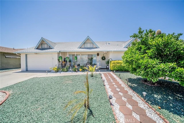 1181 W Westmont Ave, Hemet, CA 92543 - ranch-style house featuring driveway, a porch, a garage, and stucco siding