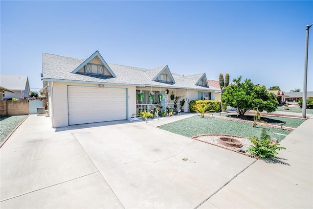1181 W Westmont Ave, Hemet, CA 92543 - view of front of home featuring concrete driveway, stucco siding, and a garage