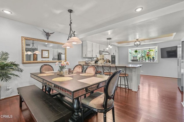 4804 La Villa Marina Unit J, Marina Del Rey, CA 90292 - dining area with dark wood-type flooring, a tray ceiling, and recessed lighting