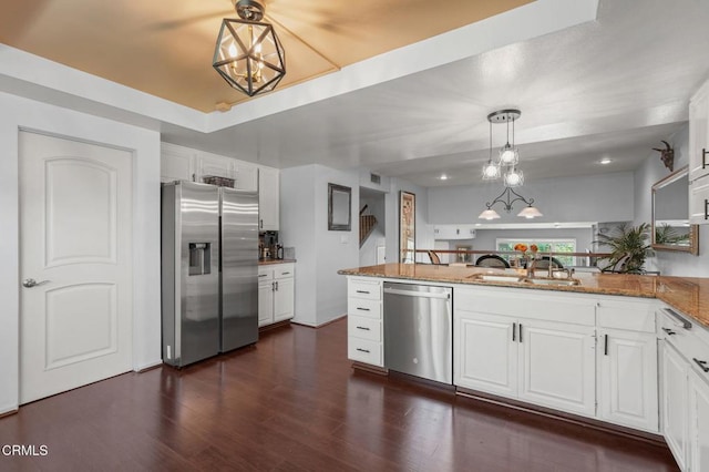 4804 La Villa Marina Unit J, Marina Del Rey, CA 90292 - kitchen with appliances with stainless steel finishes, a chandelier, and white cabinetry