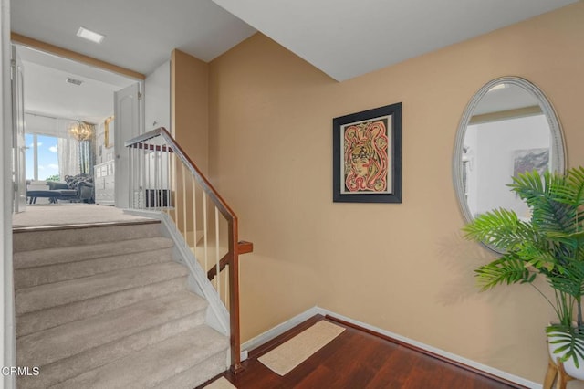 4804 La Villa Marina Unit J, Marina Del Rey, CA 90292 - staircase with wood finished floors and a chandelier