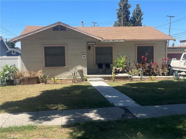 13012 Cullen St, Whittier, CA 90602 - bungalow-style house featuring a front yard, covered porch, and roof with shingles