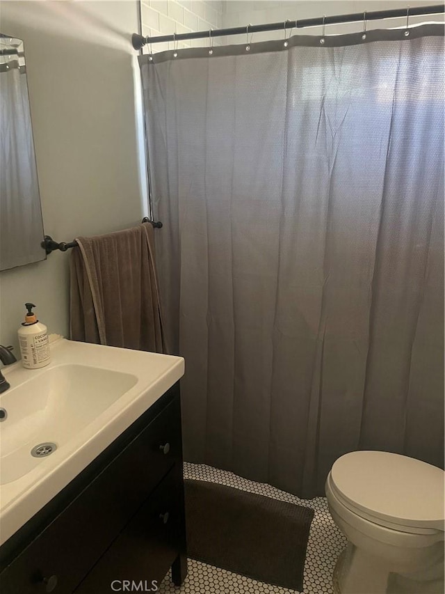13012 Cullen St, Whittier, CA 90602 - bathroom featuring tile patterned floors, vanity, and curtained shower