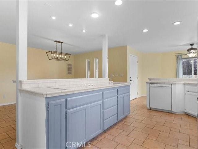 15540 China Rpds, Red Bluff, CA 96080 - kitchen featuring dishwasher, tile counters, recessed lighting, hanging light fixtures, and a ceiling fan