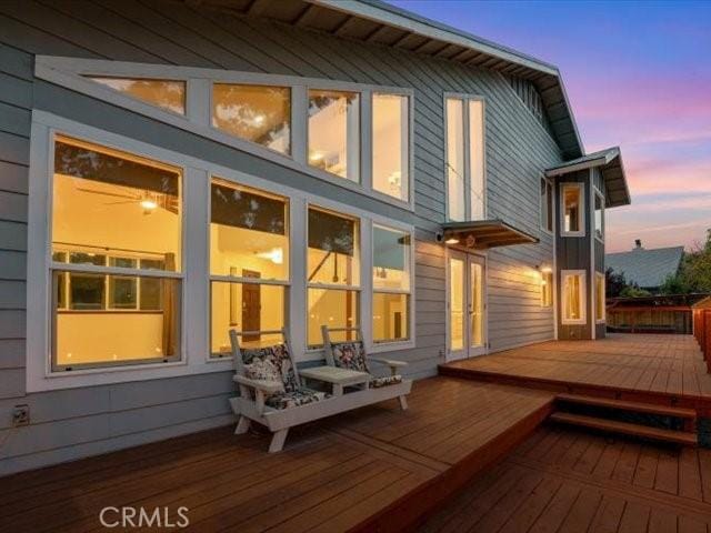 15540 China Rpds, Red Bluff, CA 96080 - back of house at dusk featuring a deck
