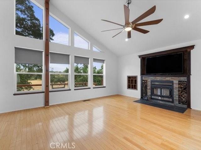 15540 China Rpds, Red Bluff, CA 96080 - unfurnished living room featuring a fireplace, a ceiling fan, wood finished floors, high vaulted ceiling, and recessed lighting