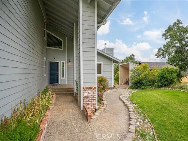 15540 China Rpds, Red Bluff, CA 96080 - doorway to property with a yard