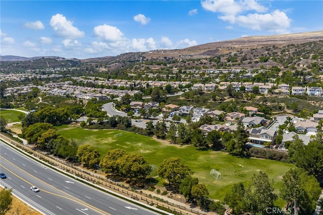 3959 Grandview Dr, Brea, CA 92823 - aerial overview of property's location featuring a mountainous background and nearby suburban area