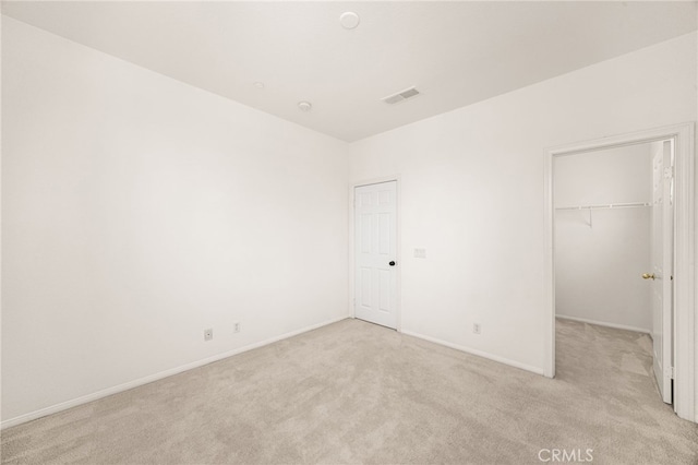 3959 Grandview Dr, Brea, CA 92823 - unfurnished bedroom featuring light carpet and a walk in closet