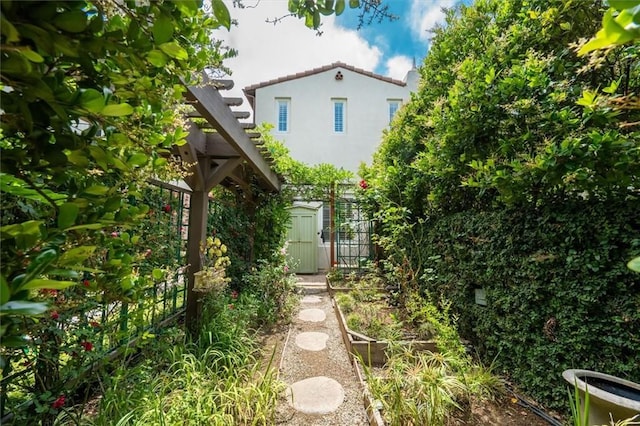 24711 Tiburon St, Valencia, CA 91355 - view of yard with a storage shed and a vegetable garden