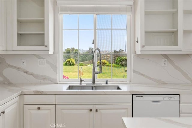 24711 Tiburon St, Valencia, CA 91355 - kitchen with white dishwasher, glass insert cabinets, white cabinets, and light stone counters