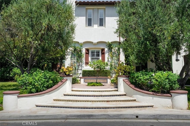 24711 Tiburon St, Valencia, CA 91355 - mediterranean / spanish-style house with stucco siding