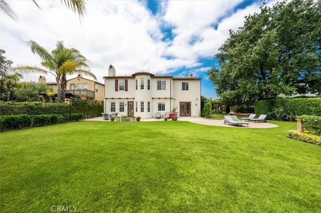 24711 Tiburon St, Valencia, CA 91355 - back of property featuring a patio area, a chimney, stucco siding, and french doors