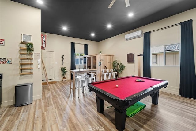 310 Teakwood Dr, Big Bear Lake, CA 92315 - game room featuring an AC wall unit, light wood-style floors, billiards table, and recessed lighting