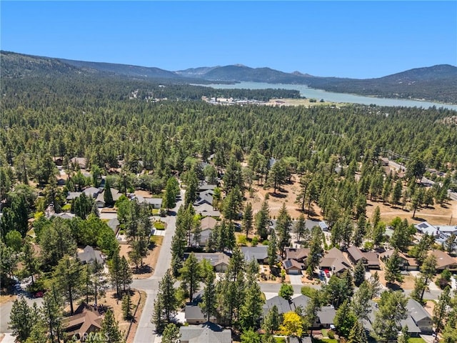 310 Teakwood Dr, Big Bear Lake, CA 92315 - aerial view of residential area featuring a heavily wooded area and a water and mountain view