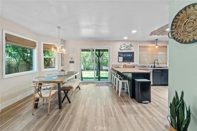 310 Teakwood Dr, Big Bear Lake, CA 92315 - dining area with light wood-style floors, a chandelier, and recessed lighting