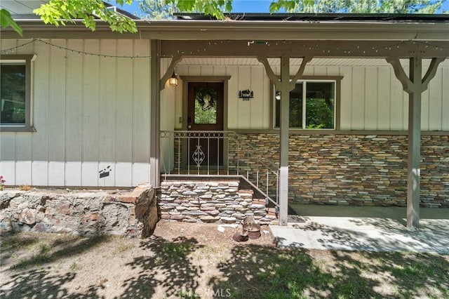 310 Teakwood Dr, Big Bear Lake, CA 92315 - doorway to property with a porch and stone siding