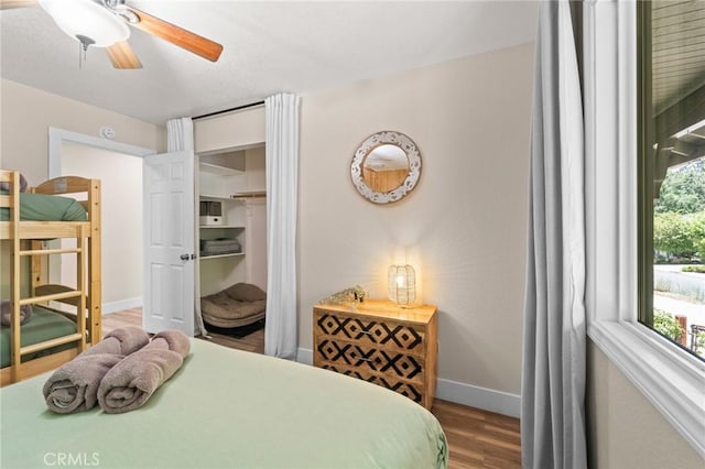 310 Teakwood Dr, Big Bear Lake, CA 92315 - bedroom with wood finished floors, a ceiling fan, and a closet