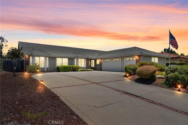 4817 Claybrook Ct, Santa Maria, CA 93455 - ranch-style house with concrete driveway, an attached garage, and a tiled roof