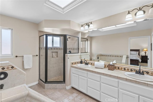4817 Claybrook Ct, Santa Maria, CA 93455 - ensuite bathroom with a shower stall, double vanity, and tile patterned floors