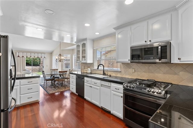 4817 Claybrook Ct, Santa Maria, CA 93455 - kitchen featuring stainless steel appliances, white cabinetry, a chandelier, plenty of natural light, and dark wood-style flooring