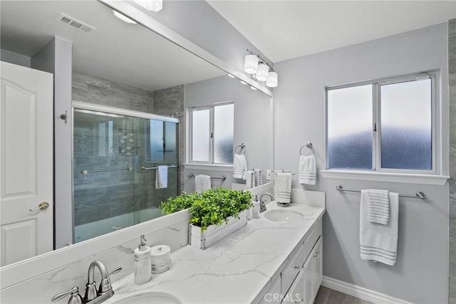 4817 Claybrook Ct, Santa Maria, CA 93455 - bathroom with double vanity and a shower with shower door