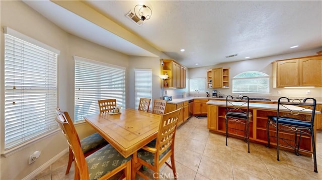 12443 Bannock Dr, Apple Valley, CA 92308 - dining area featuring light tile patterned floors and recessed lighting