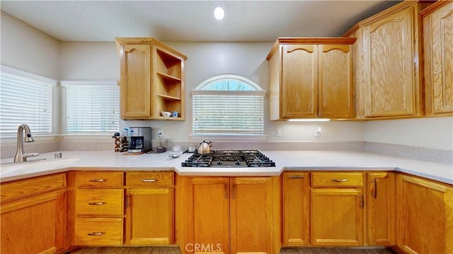 12443 Bannock Dr, Apple Valley, CA 92308 - kitchen featuring gas stovetop, light countertops, and open shelves