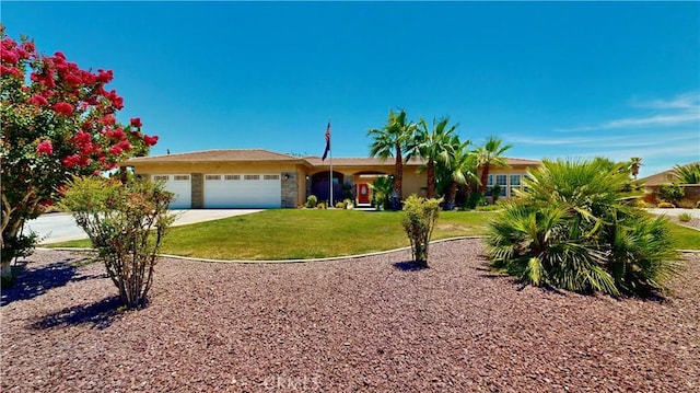 12443 Bannock Dr, Apple Valley, CA 92308 - ranch-style house featuring an attached garage, a front yard, concrete driveway, and stone siding
