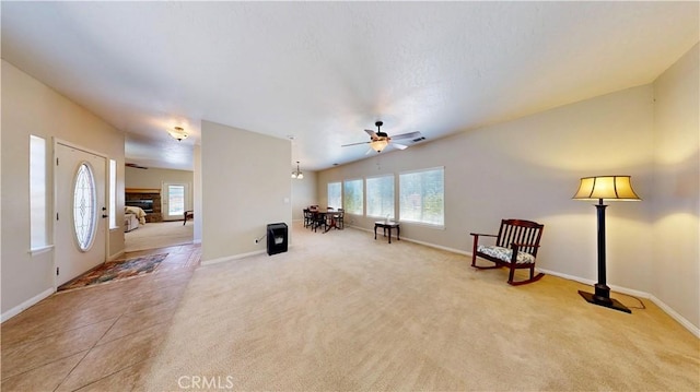 12443 Bannock Dr, Apple Valley, CA 92308 - unfurnished living room with a ceiling fan and carpet