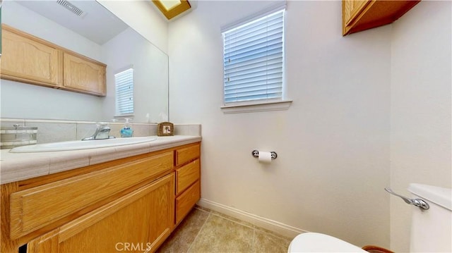 12443 Bannock Dr, Apple Valley, CA 92308 - bathroom with toilet and vanity