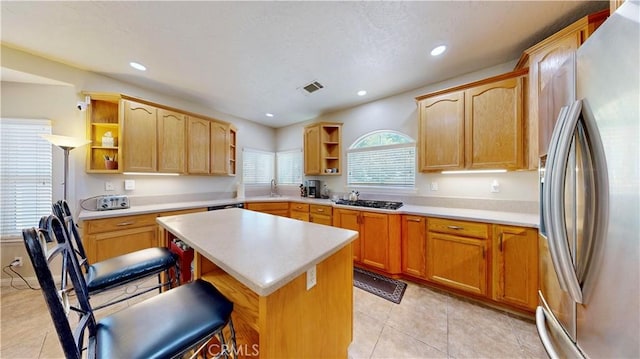 12443 Bannock Dr, Apple Valley, CA 92308 - kitchen with freestanding refrigerator, open shelves, a kitchen island, light countertops, and recessed lighting