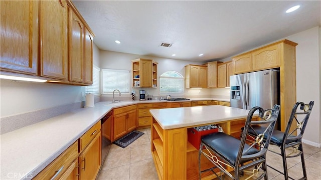 12443 Bannock Dr, Apple Valley, CA 92308 - kitchen featuring open shelves, a center island, light tile patterned floors, stainless steel appliances, and recessed lighting