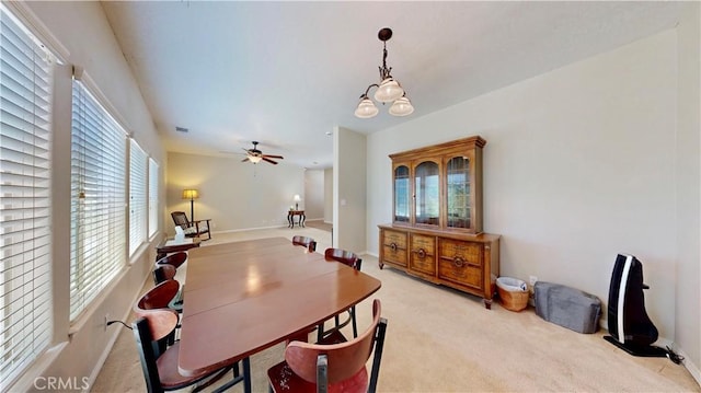 12443 Bannock Dr, Apple Valley, CA 92308 - dining space featuring plenty of natural light, light colored carpet, and ceiling fan