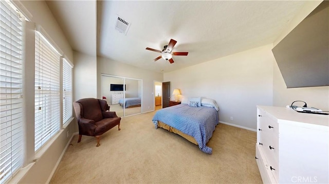 12443 Bannock Dr, Apple Valley, CA 92308 - bedroom featuring multiple windows, light colored carpet, and a ceiling fan