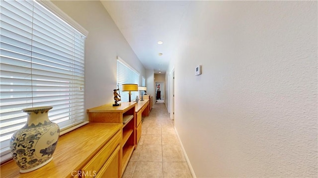 12443 Bannock Dr, Apple Valley, CA 92308 - hall featuring light tile patterned floors and baseboards