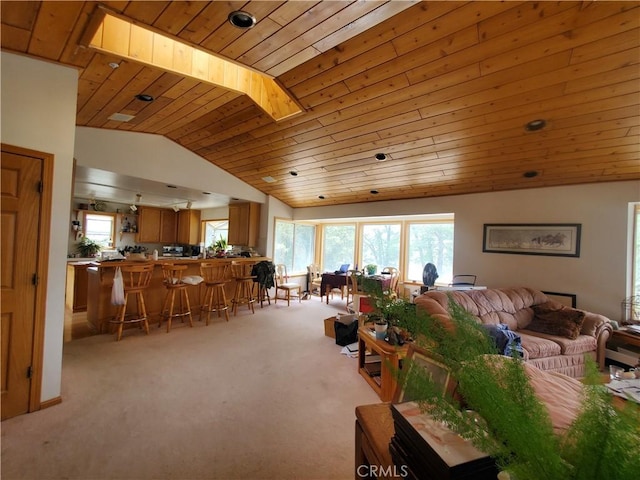 535 N Dart Canyon Rd, Crestline, CA 92325 - living room featuring light carpet, lofted ceiling, wood ceiling, and a dry bar