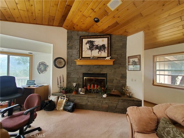 535 N Dart Canyon Rd, Crestline, CA 92325 - carpeted living room with vaulted ceiling, wooden ceiling, plenty of natural light, and a stone fireplace