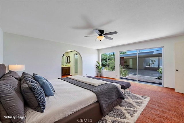 5347 E Bergh Dr, Anaheim Hills, CA 92807 - carpeted bedroom with access to exterior, arched walkways, a ceiling fan, and connected bathroom