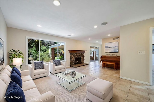 5347 E Bergh Dr, Anaheim Hills, CA 92807 - living room featuring recessed lighting, light tile patterned floors, and a stone fireplace